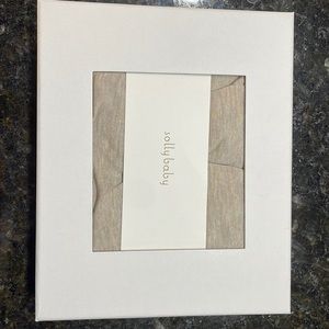 Solly baby wrap in flax.